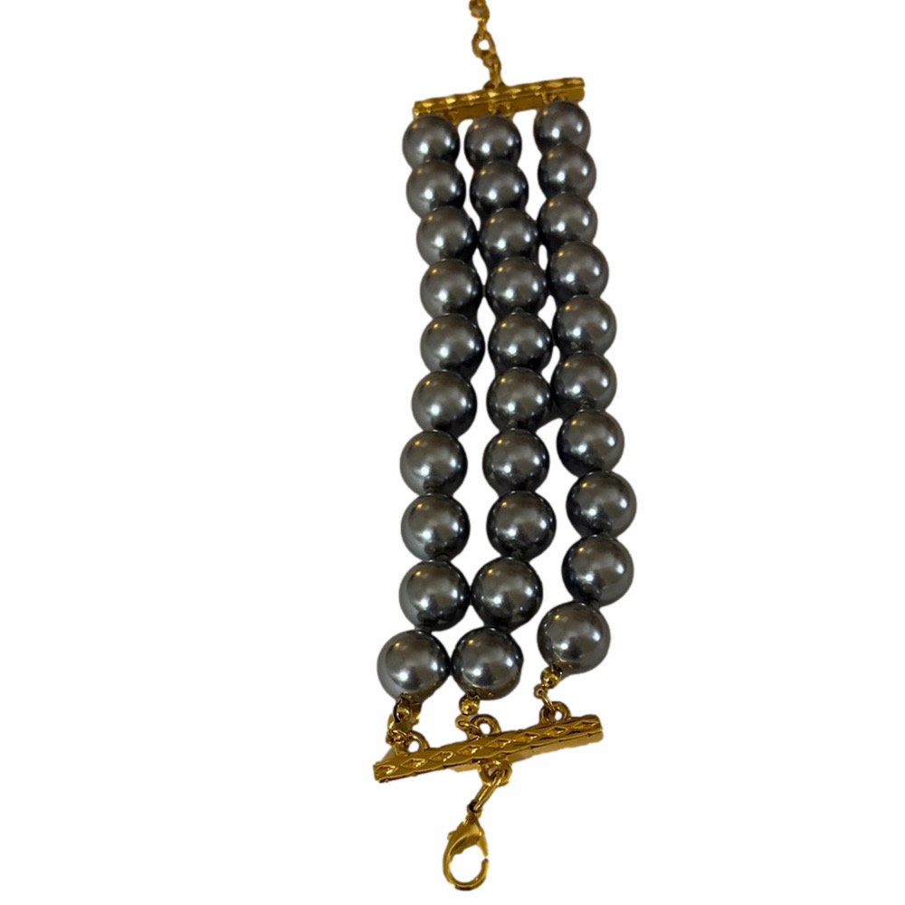Joan Rivers Vintage Three strand grey faux pearl braclet.